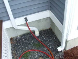 Connecting A Gutter Downspout to Foundation Drain - Home Construction