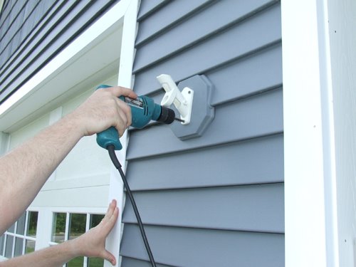 attaching-flag-pole-bracket - Home Construction Improvement